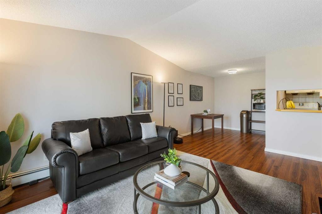 413-33 Arbour Grove Close Nw, Calgary, AB - Indoor Photo Showing Living Room