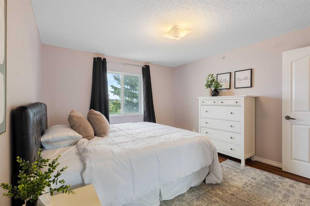 413-33 Arbour Grove Close Nw, Calgary, AB - Indoor Photo Showing Bedroom