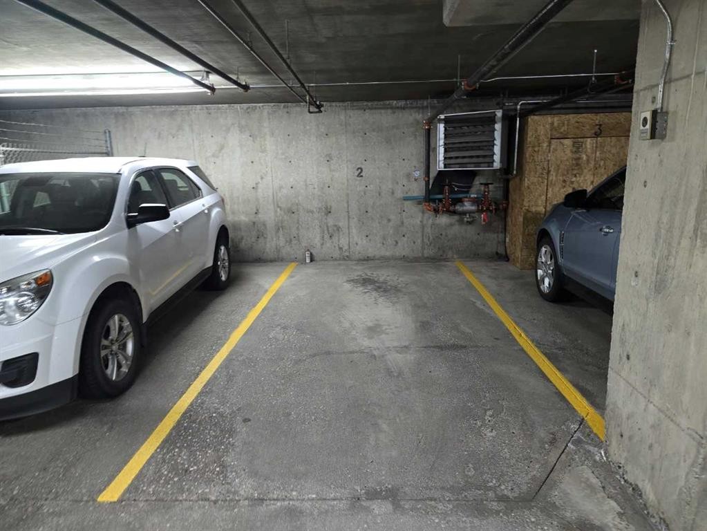 413-33 Arbour Grove Close Nw, Calgary, AB - Indoor Photo Showing Garage