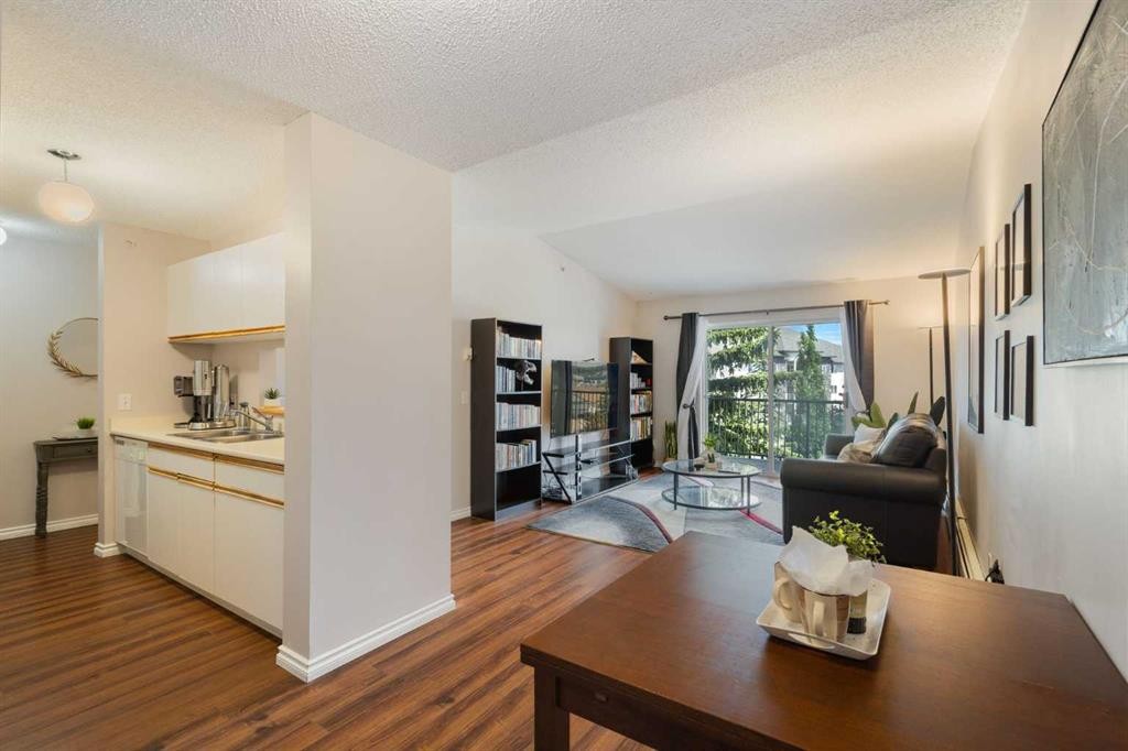 413-33 Arbour Grove Close Nw, Calgary, AB - Indoor Photo Showing Living Room