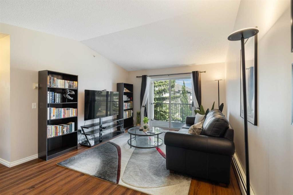 413-33 Arbour Grove Close Nw, Calgary, AB - Indoor Photo Showing Living Room