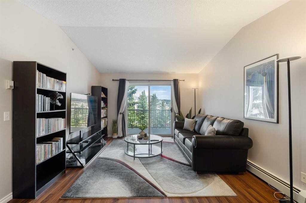 413-33 Arbour Grove Close Nw, Calgary, AB - Indoor Photo Showing Living Room
