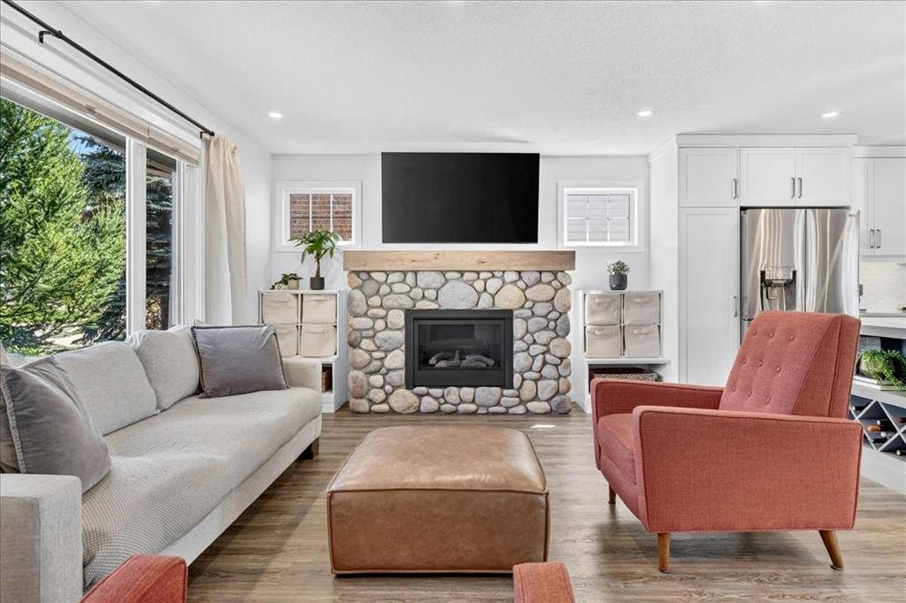 7327 Silver Springs Road Nw, Calgary, AB - Indoor Photo Showing Living Room With Fireplace