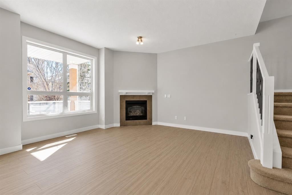 34 Royal Manor Nw, Calgary, AB - Indoor Photo Showing Living Room With Fireplace