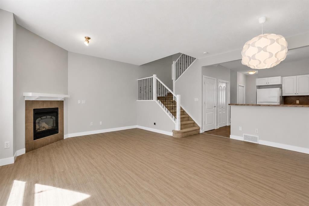 34 Royal Manor Nw, Calgary, AB - Indoor With Fireplace