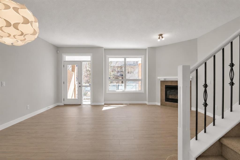 34 Royal Manor Nw, Calgary, AB - Indoor With Fireplace