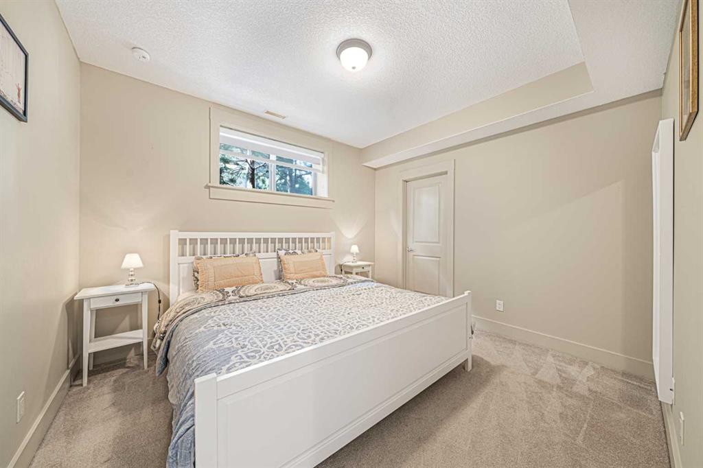 2 Discovery Ridge Heights Sw, Calgary, AB - Indoor Photo Showing Bedroom