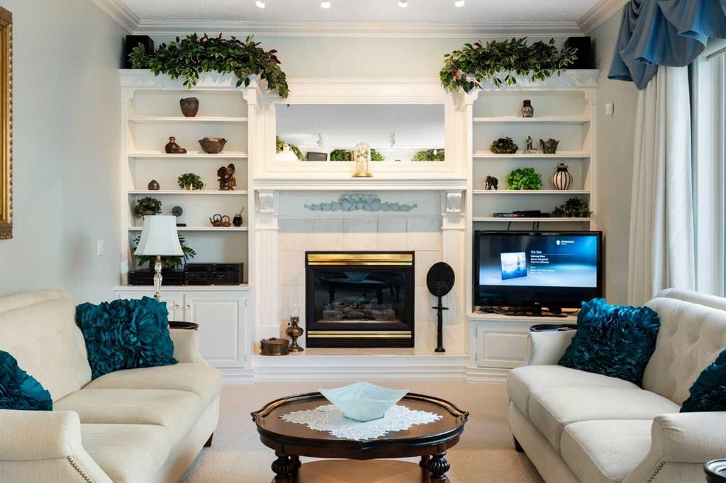 1649 Evergreen Hill Sw, Calgary, AB - Indoor Photo Showing Living Room With Fireplace