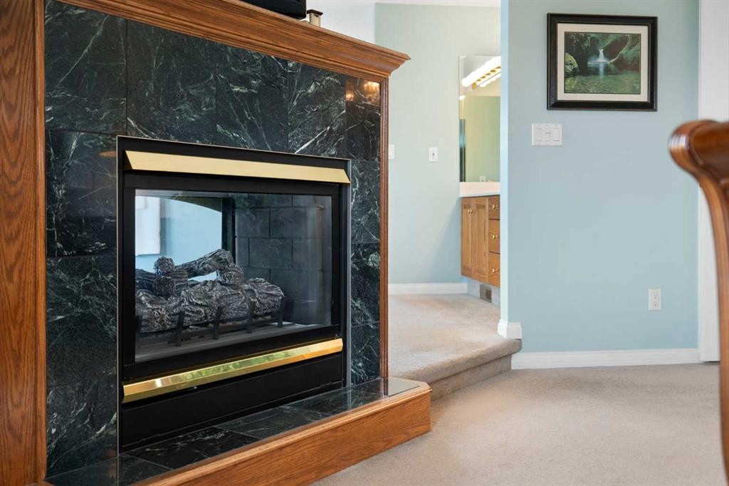 1649 Evergreen Hill Sw, Calgary, AB - Indoor With Fireplace