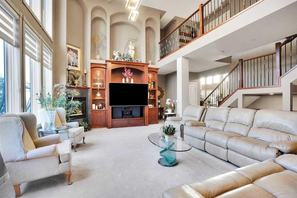 99 Arbour Vista Road Nw, Calgary, AB - Indoor Photo Showing Living Room With Fireplace