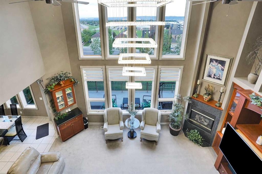 99 Arbour Vista Road Nw, Calgary, AB - Indoor With Fireplace