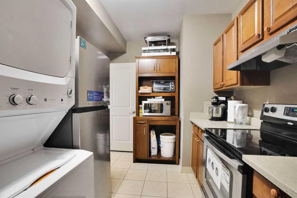 99 Arbour Vista Road Nw, Calgary, AB - Indoor Photo Showing Laundry Room