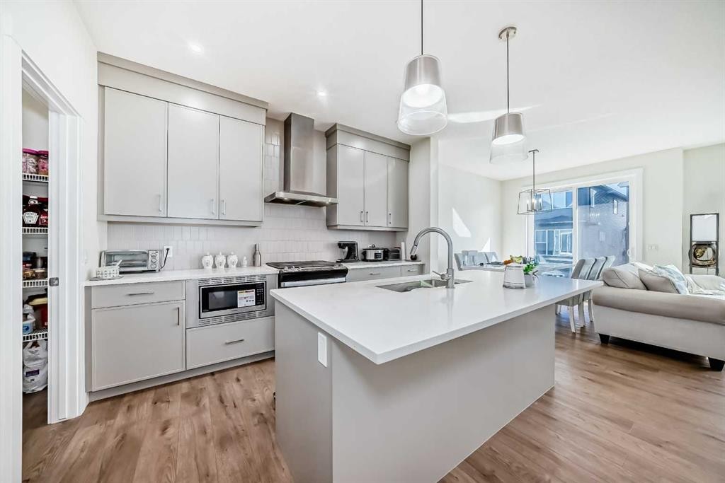 138 Silver Spruce Grove Sw, Calgary, AB - Indoor Photo Showing Kitchen With Upgraded Kitchen