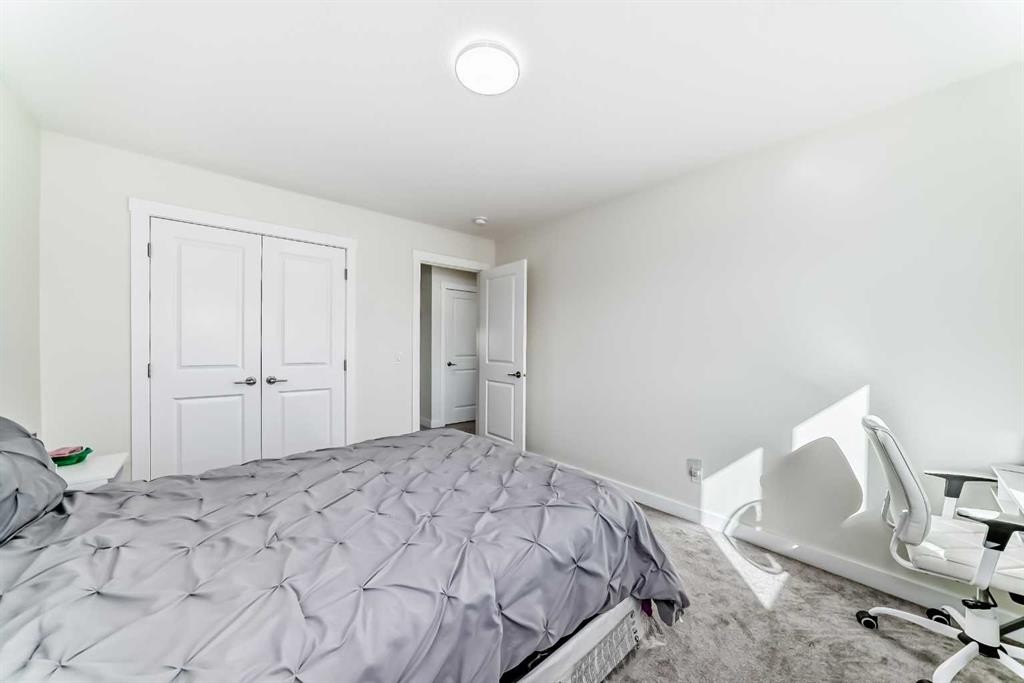 138 Silver Spruce Grove Sw, Calgary, AB - Indoor Photo Showing Bedroom