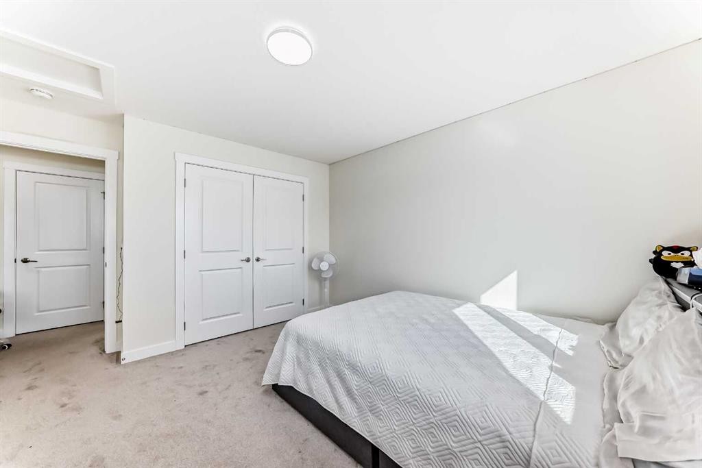 138 Silver Spruce Grove Sw, Calgary, AB - Indoor Photo Showing Bedroom