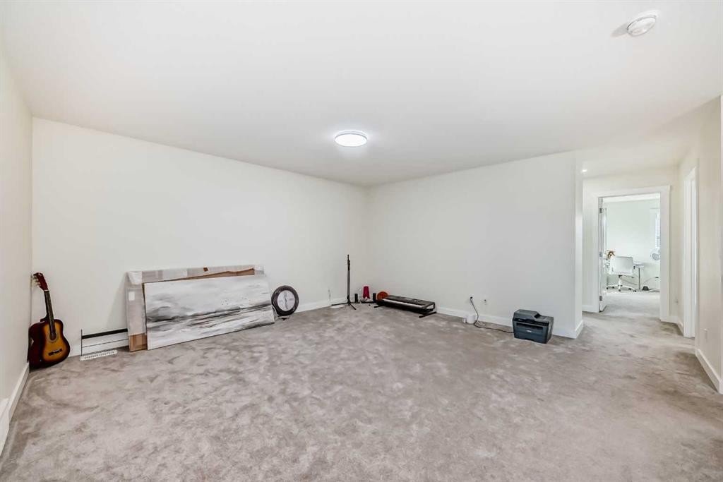 138 Silver Spruce Grove Sw, Calgary, AB - Indoor Photo Showing Other Room