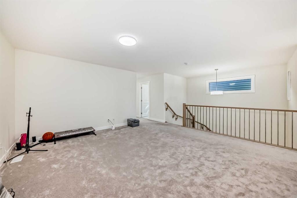 138 Silver Spruce Grove Sw, Calgary, AB - Indoor Photo Showing Other Room