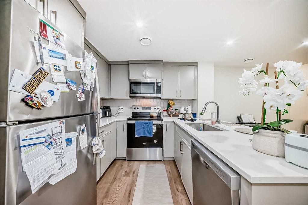 138 Silver Spruce Grove Sw, Calgary, AB - Indoor Photo Showing Kitchen With Stainless Steel Kitchen