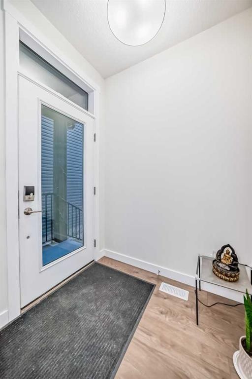 138 Silver Spruce Grove Sw, Calgary, AB - Indoor Photo Showing Other Room