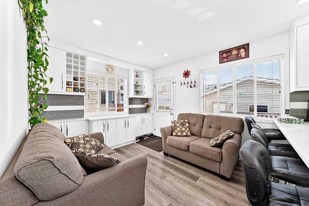 24 Taralake Road Ne, Calgary, AB - Indoor Photo Showing Living Room