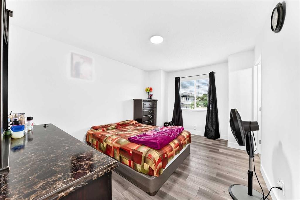 24 Taralake Road Ne, Calgary, AB - Indoor Photo Showing Bedroom