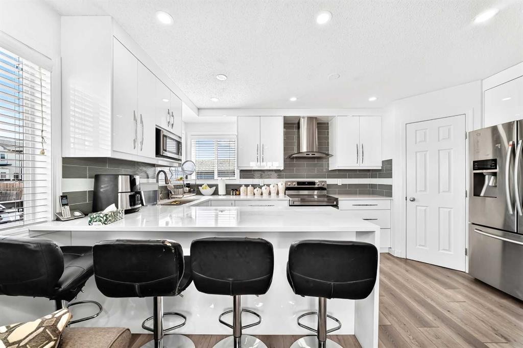 24 Taralake Road Ne, Calgary, AB - Indoor Photo Showing Kitchen With Upgraded Kitchen