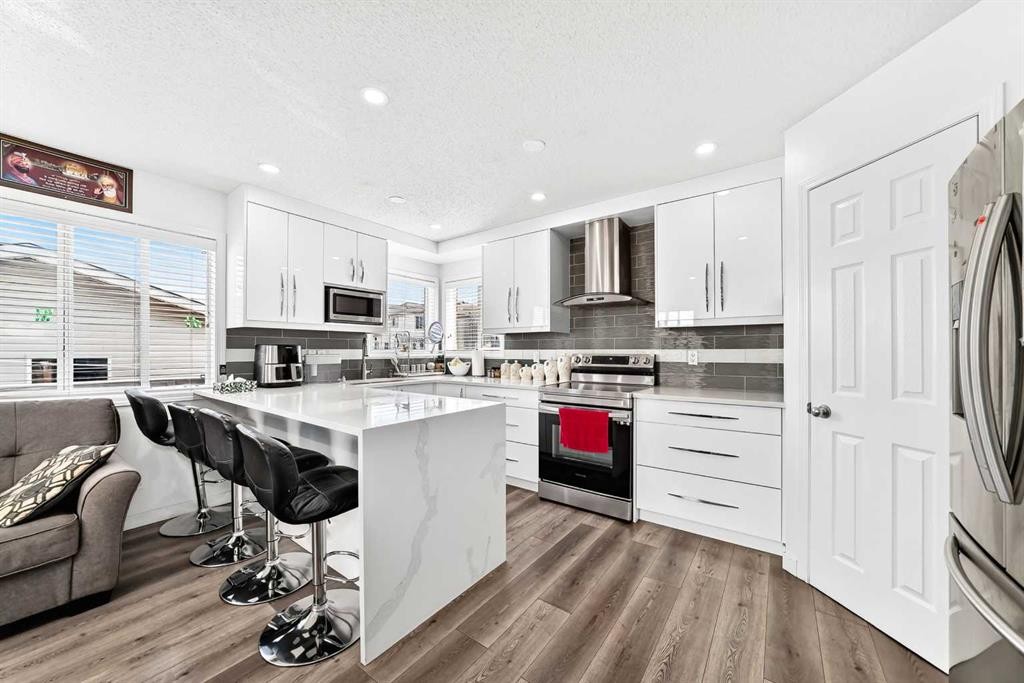 24 Taralake Road Ne, Calgary, AB - Indoor Photo Showing Kitchen With Upgraded Kitchen