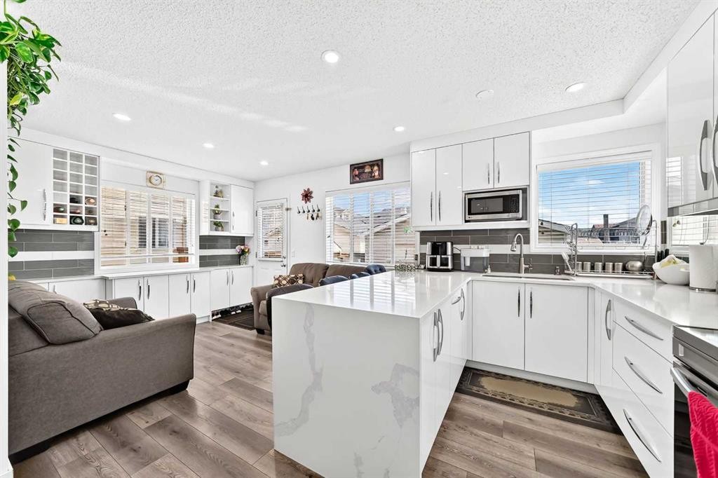 24 Taralake Road Ne, Calgary, AB - Indoor Photo Showing Kitchen With Upgraded Kitchen