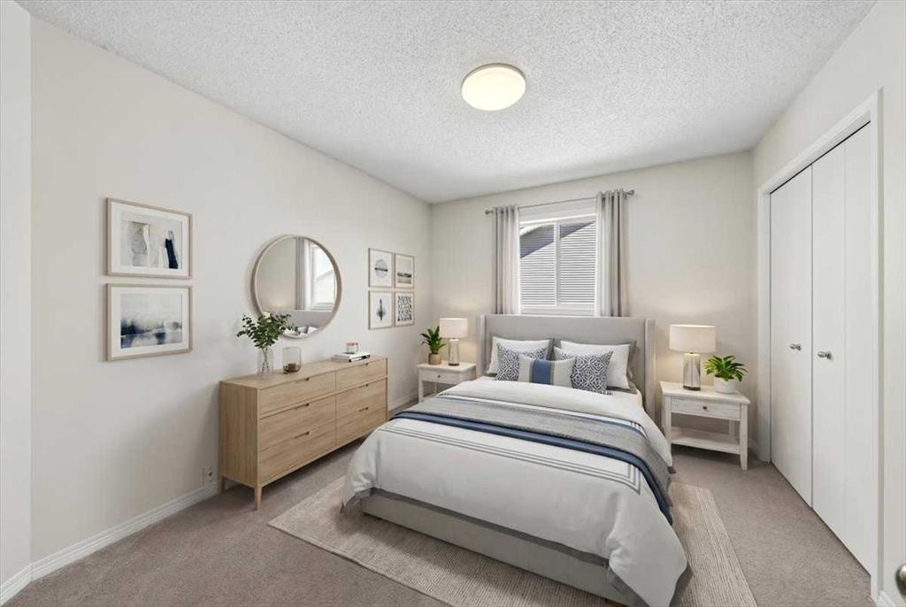 18 Cougarstone Bay Sw, Calgary, AB - Indoor Photo Showing Bedroom