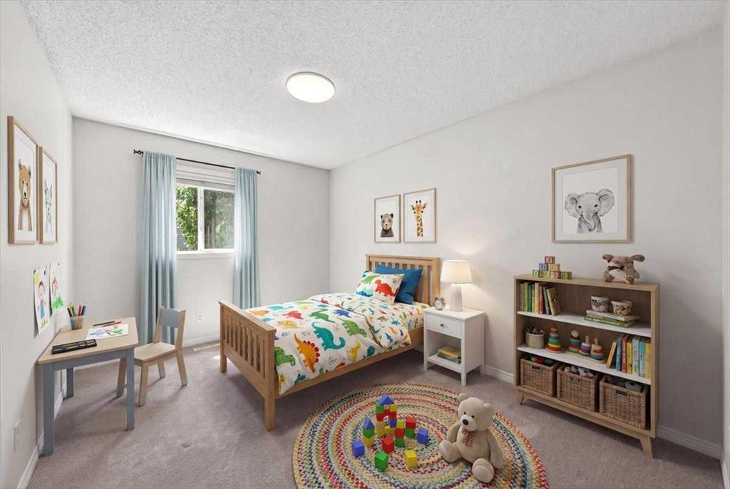 18 Cougarstone Bay Sw, Calgary, AB - Indoor Photo Showing Bedroom