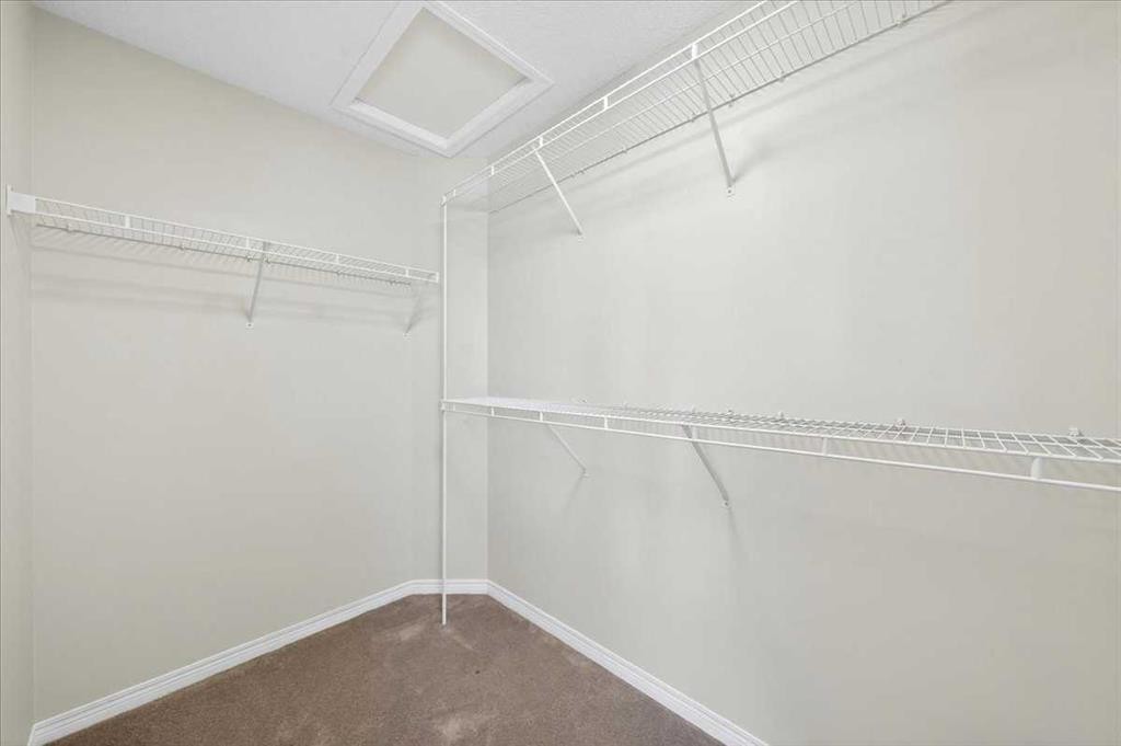 18 Cougarstone Bay Sw, Calgary, AB - Indoor With Storage