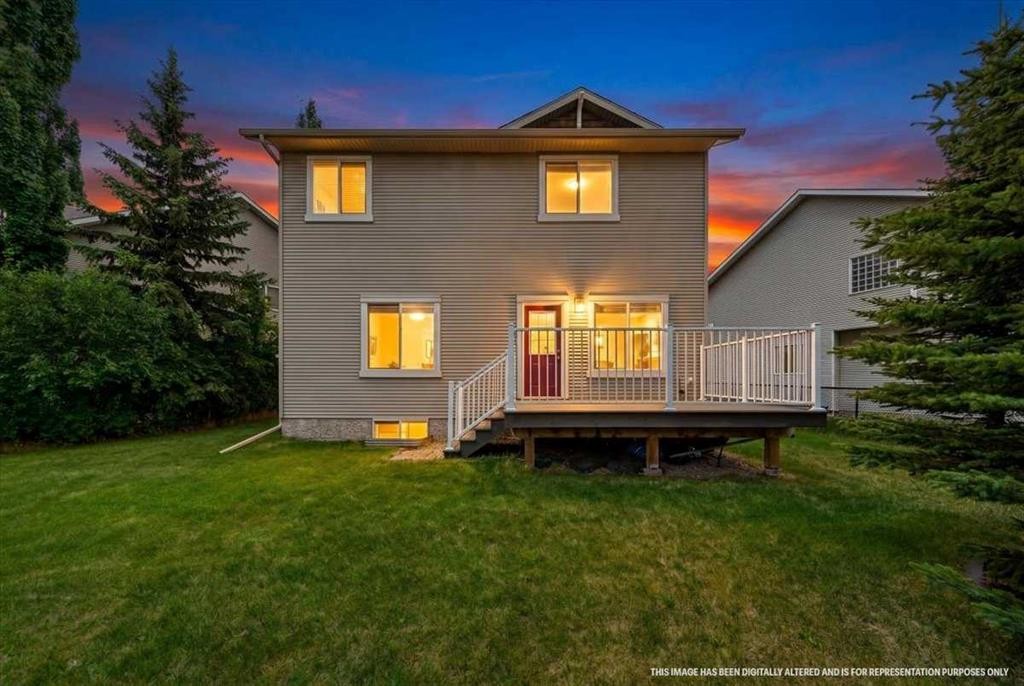 18 Cougarstone Bay Sw, Calgary, AB - Outdoor With Deck Patio Veranda