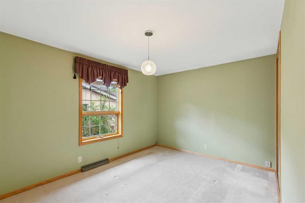 47 Montrose Crescent Ne, Calgary, AB - Indoor Photo Showing Other Room