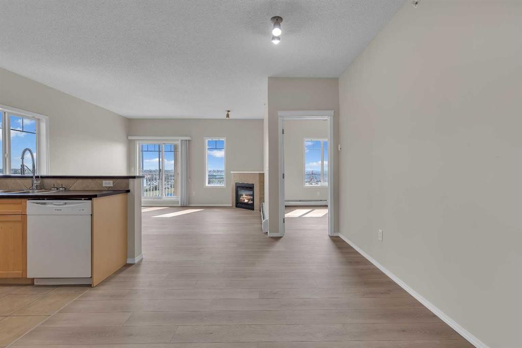 6307-70 Panamount Drive Nw, Calgary, AB - Indoor With Fireplace