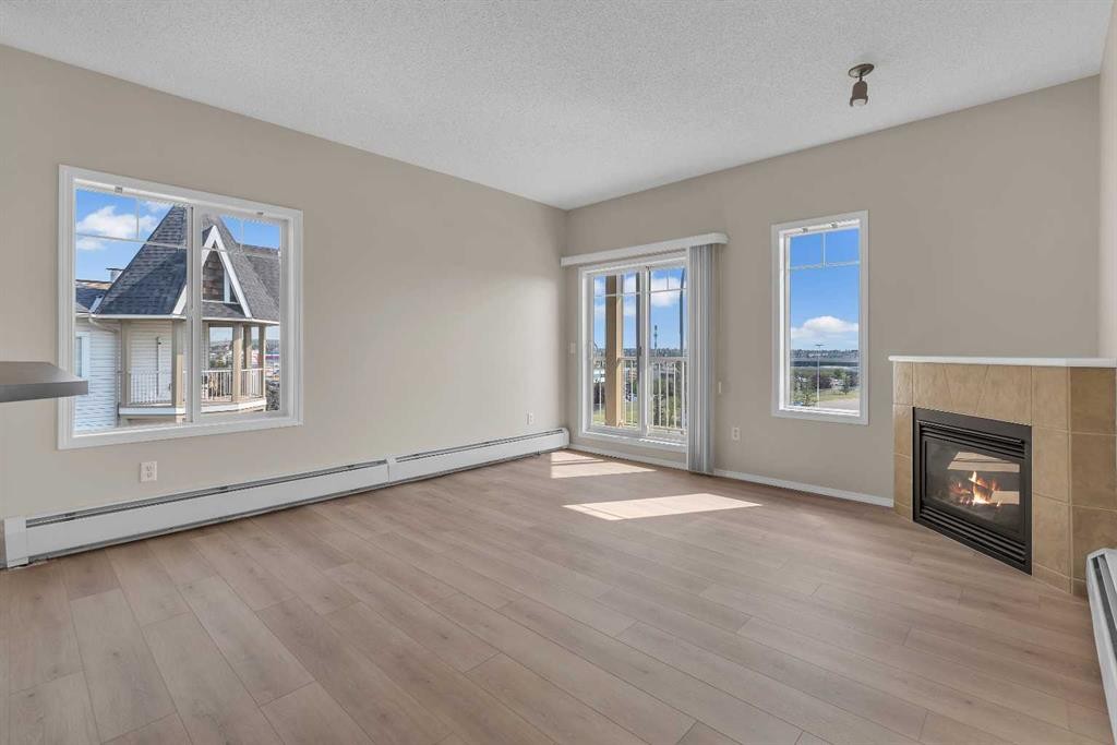 6307-70 Panamount Drive Nw, Calgary, AB - Indoor With Fireplace