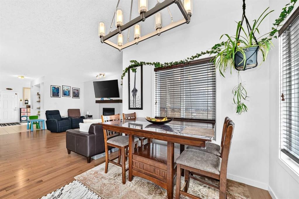 16 Sunrise Crescent, Cochrane, AB - Indoor With Fireplace