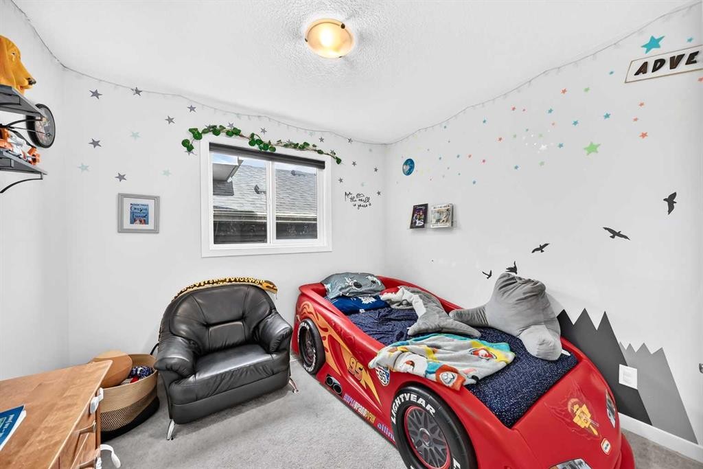 16 Sunrise Crescent, Cochrane, AB - Indoor Photo Showing Other Room
