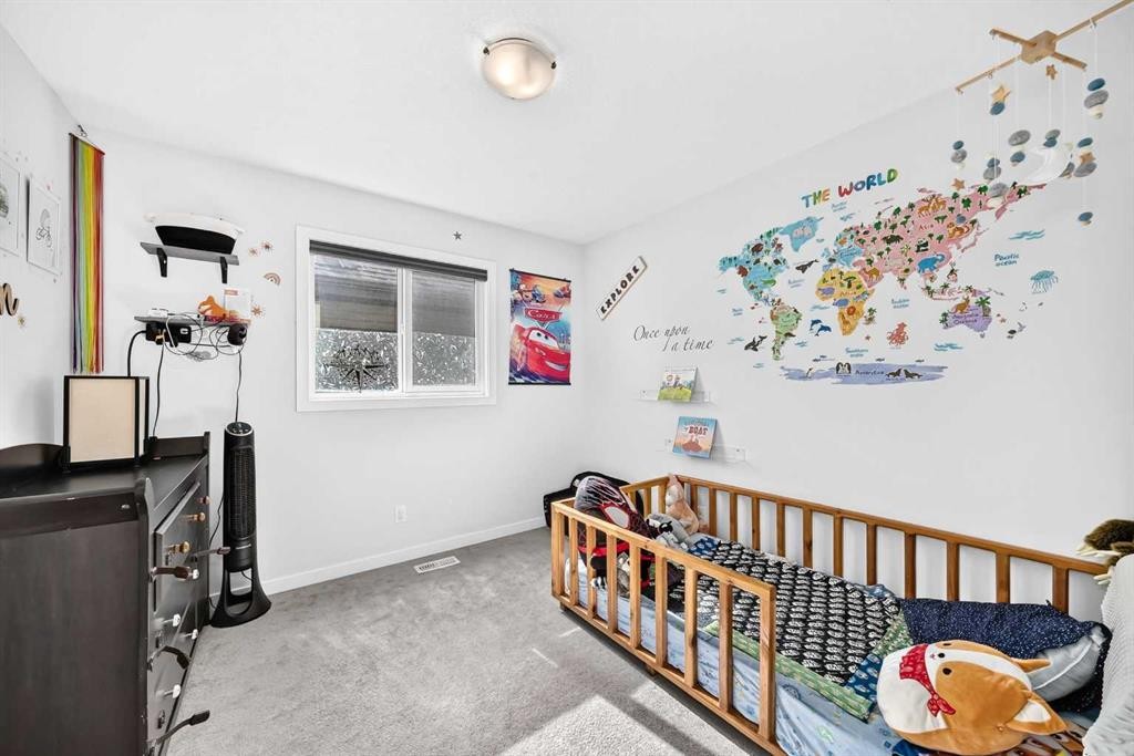 16 Sunrise Crescent, Cochrane, AB - Indoor Photo Showing Other Room