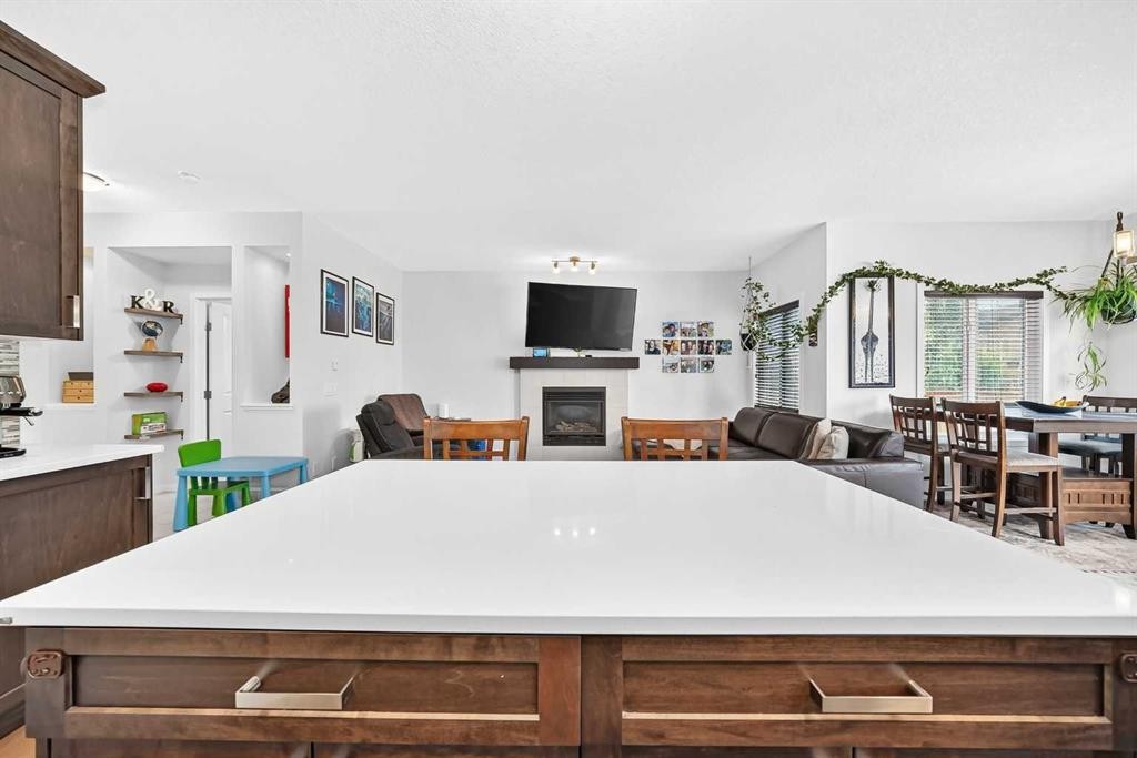 16 Sunrise Crescent, Cochrane, AB - Indoor With Fireplace