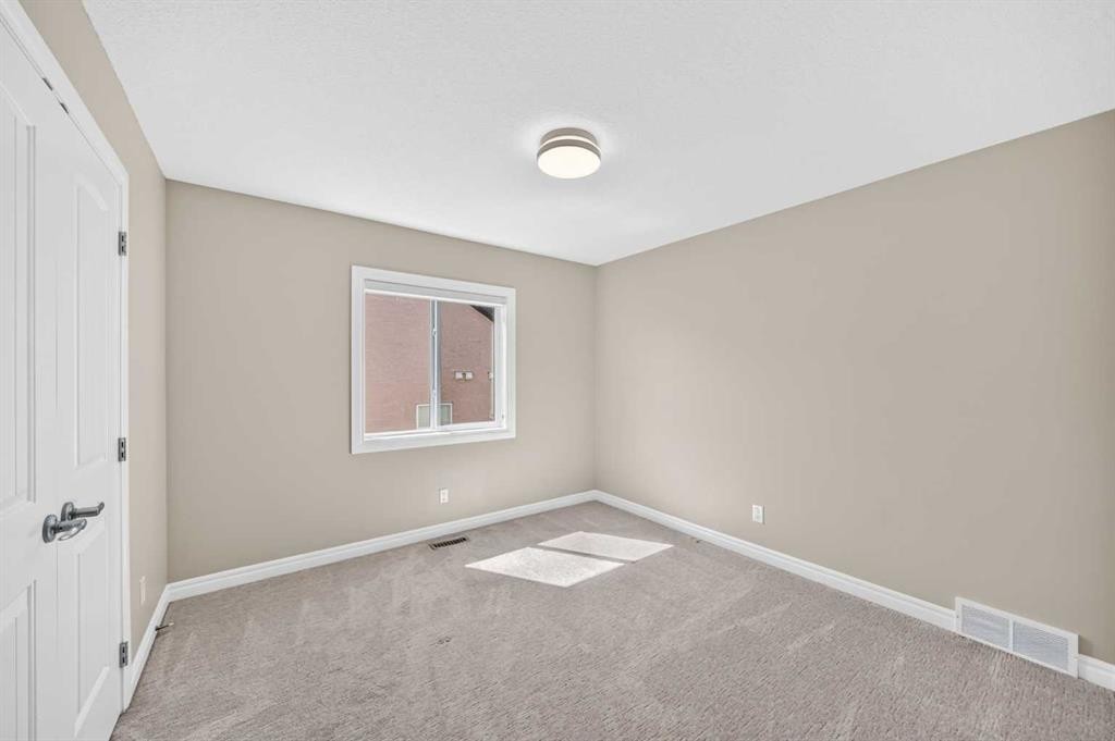 173 Aspenshire Drive Sw, Calgary, AB - Indoor Photo Showing Other Room