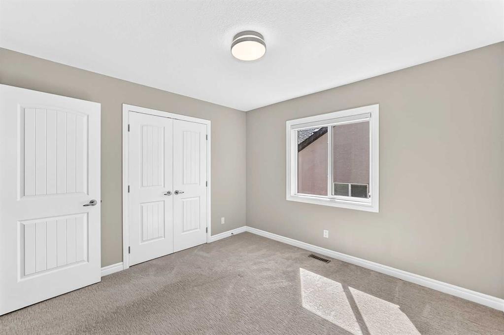 173 Aspenshire Drive Sw, Calgary, AB - Indoor Photo Showing Other Room