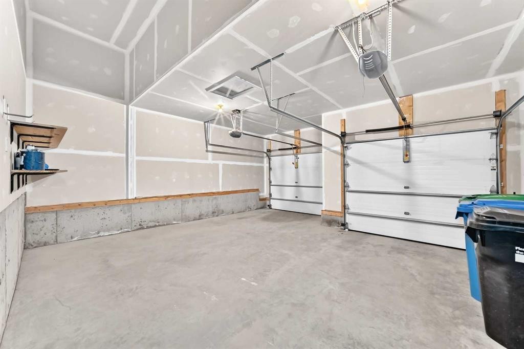173 Aspenshire Drive Sw, Calgary, AB - Indoor Photo Showing Garage