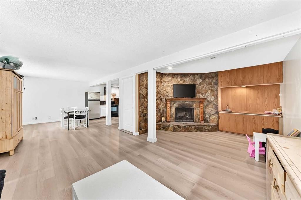 11 Bedford Drive Ne, Calgary, AB - Indoor With Fireplace