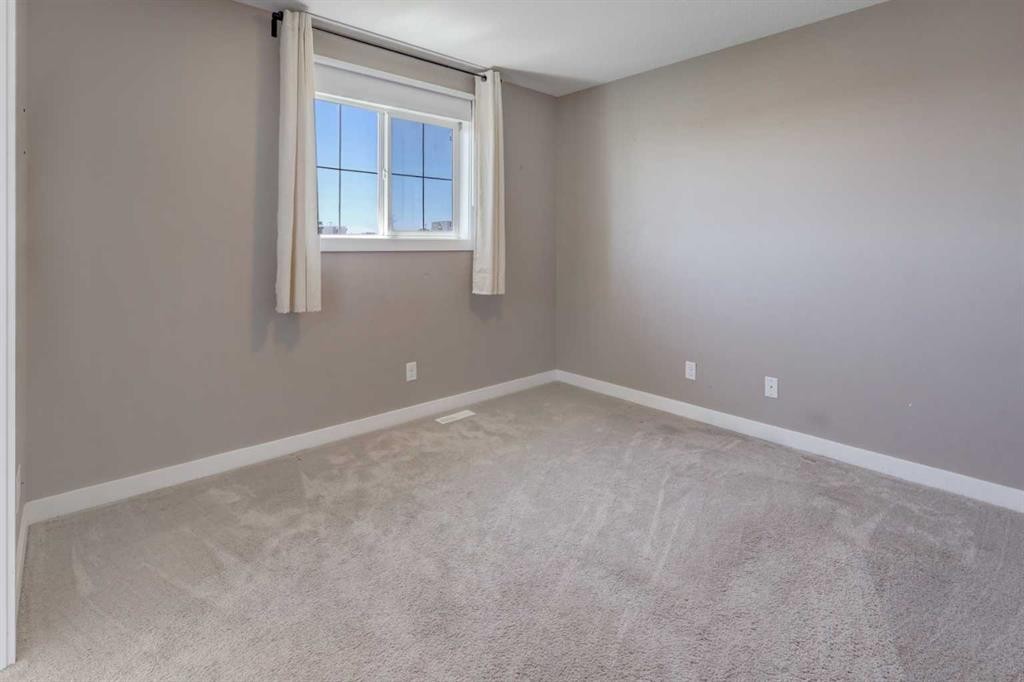 249 Ranch Ridge Meadow, Strathmore, AB - Indoor Photo Showing Other Room