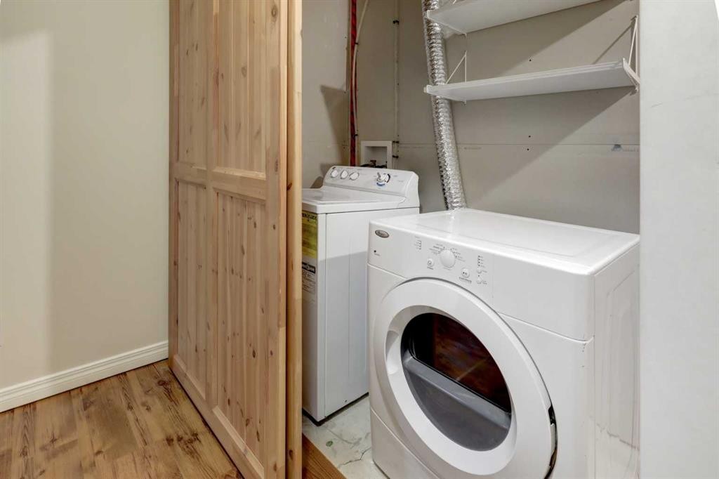 249 Ranch Ridge Meadow, Strathmore, AB - Indoor Photo Showing Laundry Room