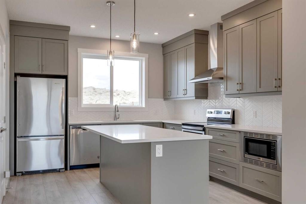 306 Haskayne Drive Nw, Calgary, AB - Indoor Photo Showing Kitchen With Upgraded Kitchen