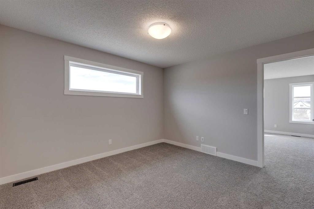 306 Haskayne Drive Nw, Calgary, AB - Indoor Photo Showing Other Room
