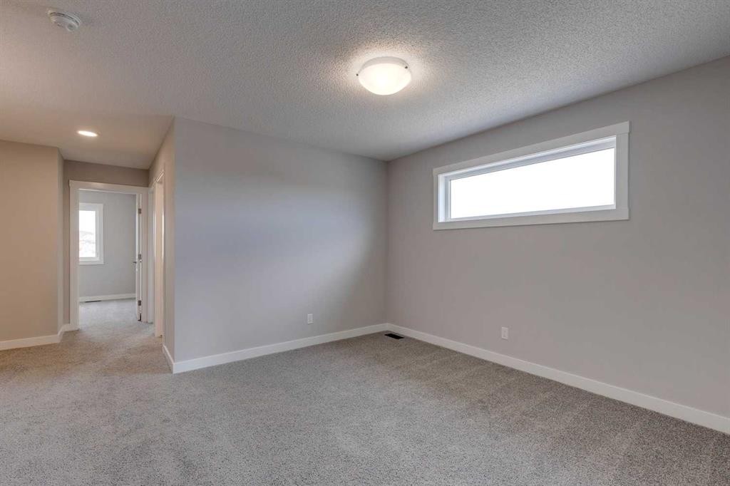 306 Haskayne Drive Nw, Calgary, AB - Indoor Photo Showing Other Room
