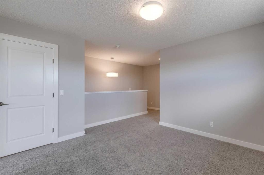 306 Haskayne Drive Nw, Calgary, AB - Indoor Photo Showing Other Room
