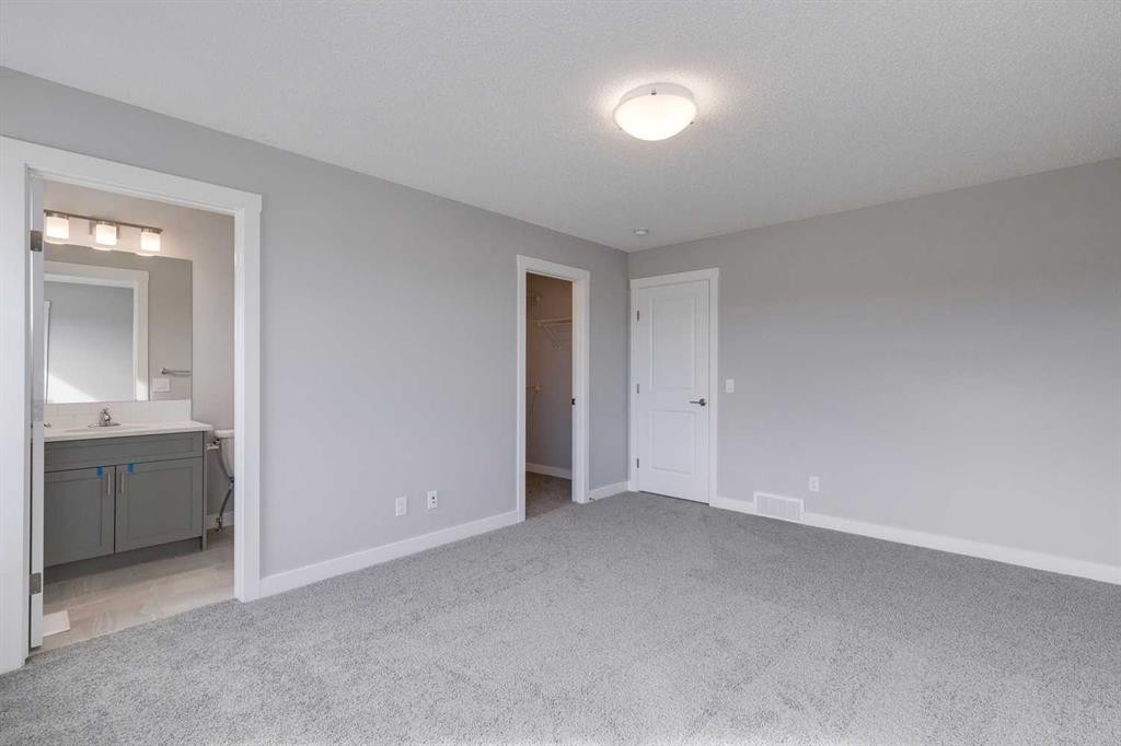 306 Haskayne Drive Nw, Calgary, AB - Indoor Photo Showing Other Room